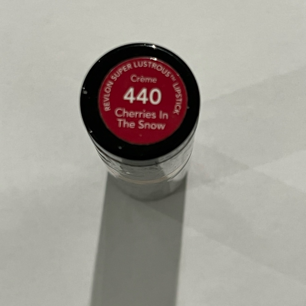 Revlon Lipstick in Black Tube with Gold Band 440 cherries in the snow